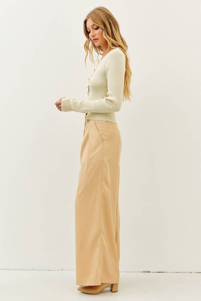 BOLD STATEMENT METALLIC SWEATER KNIT TOP WITH BOWS