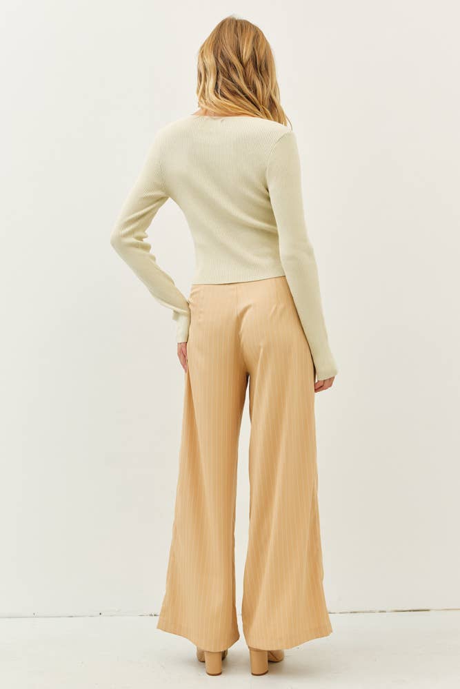 BOLD STATEMENT METALLIC SWEATER KNIT TOP WITH BOWS