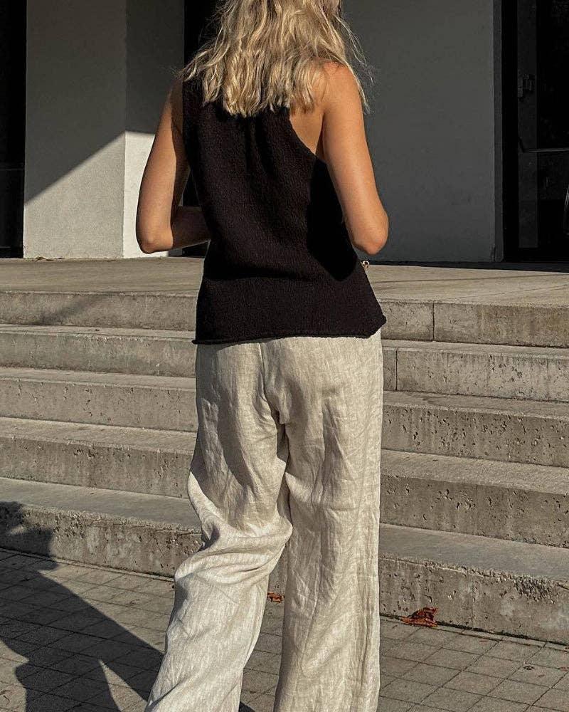 Classic Ladies Solid Color V Neck Knit Vest featuring a timeless design, perfect for layering over shirts and dresses