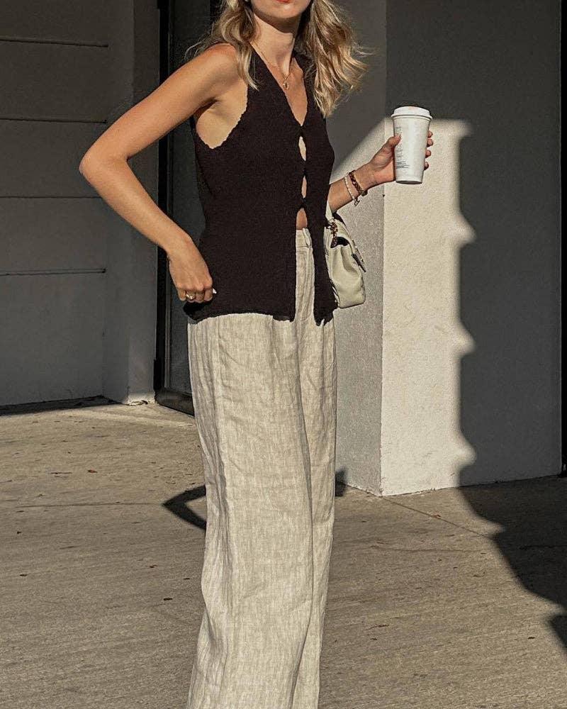 Classic Ladies Solid Color V Neck Knit Vest featuring a timeless design, perfect for layering over shirts and dresses