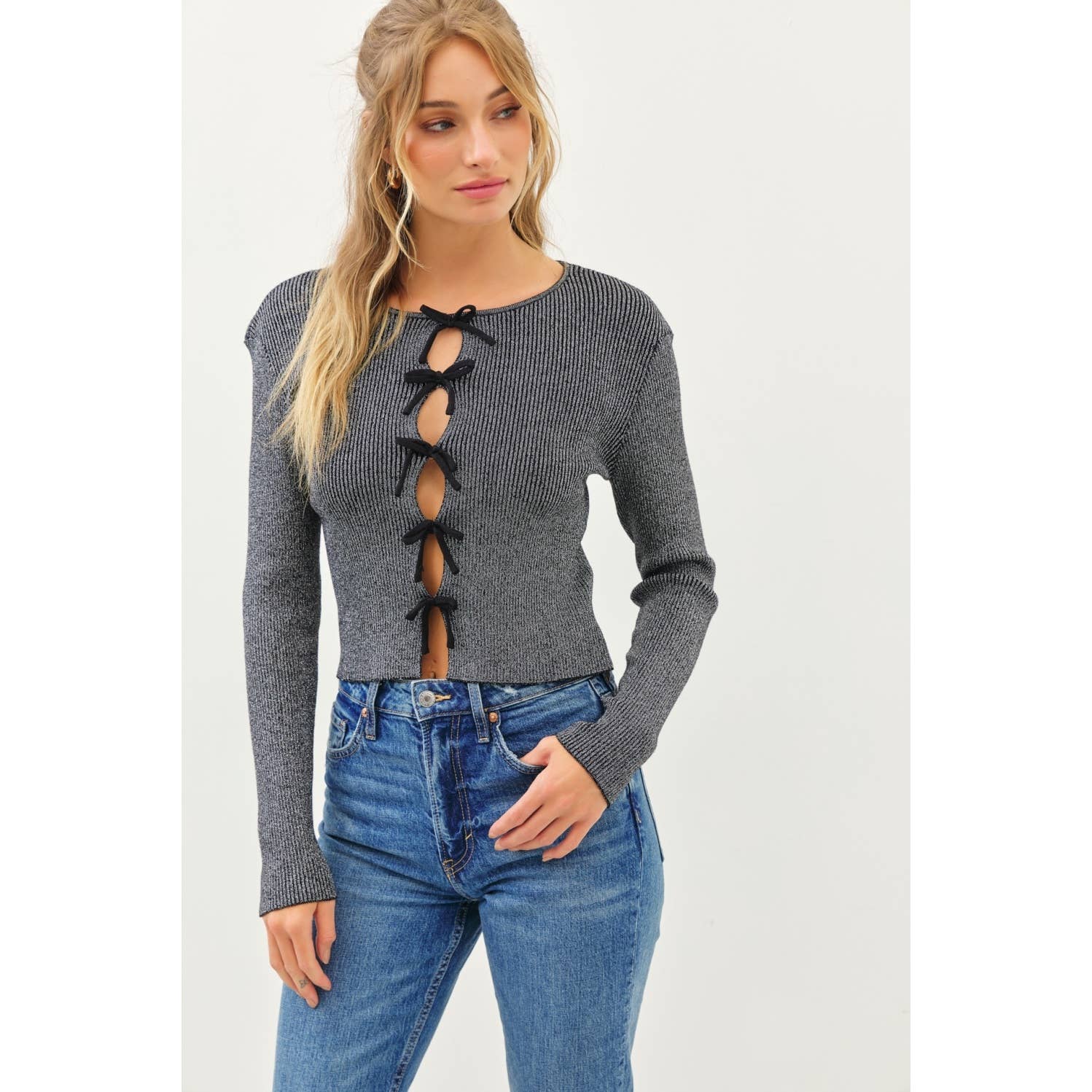 BOLD STATEMENT METALLIC SWEATER KNIT TOP WITH BOWS