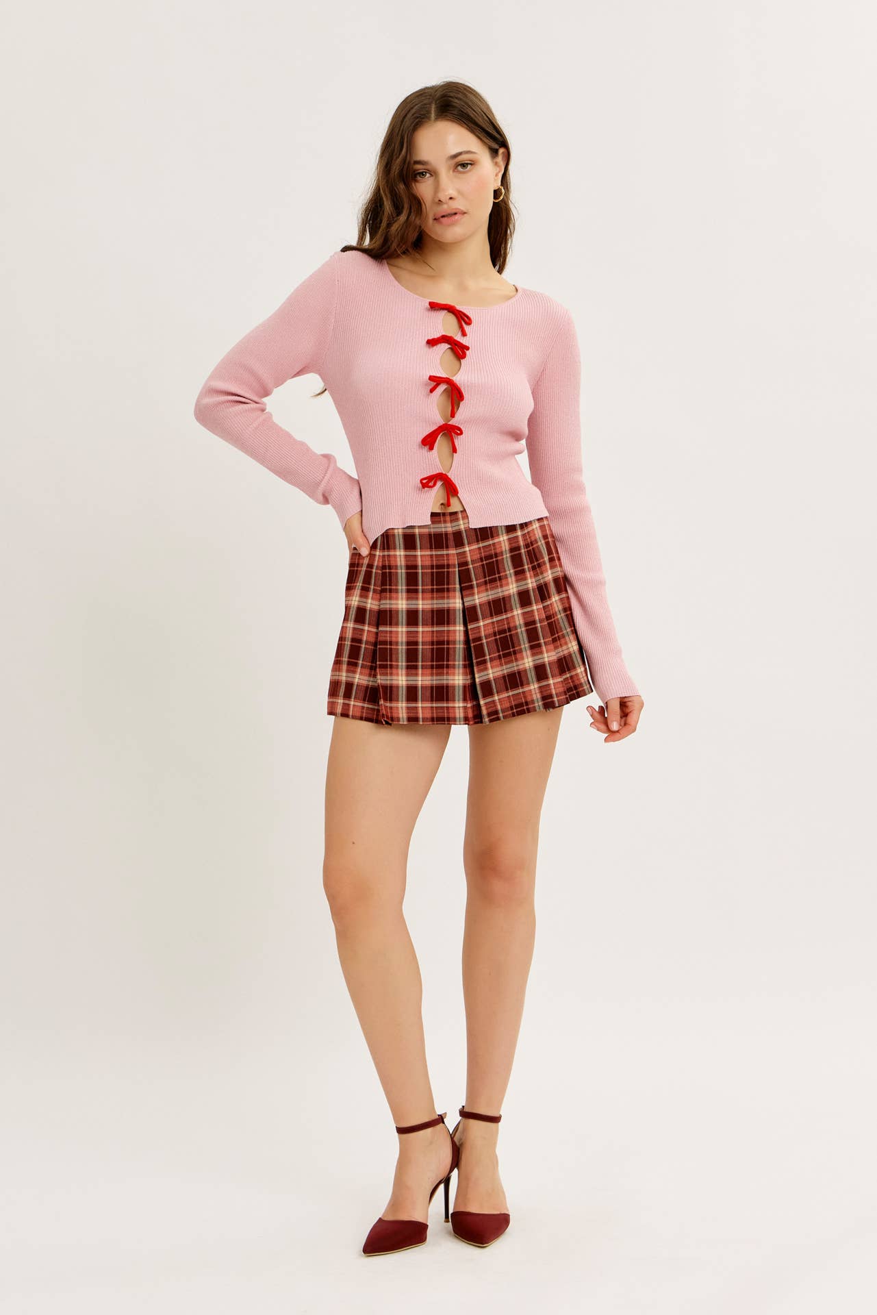 BOLD STATEMENT METALLIC SWEATER KNIT TOP WITH BOWS