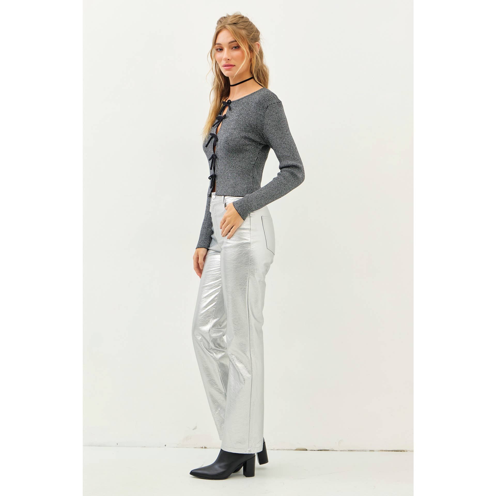 BOLD STATEMENT METALLIC SWEATER KNIT TOP WITH BOWS