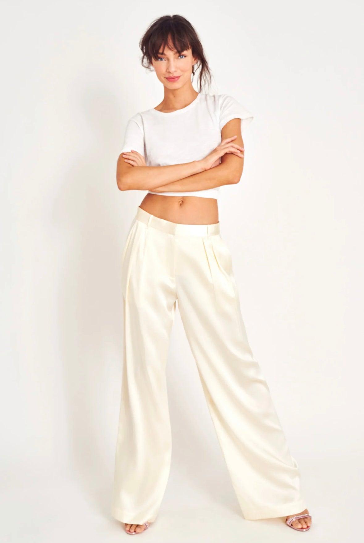 Elegant Love Shack Fancy Emberlynn Pant in Ivory featuring a flowing design and delicate details, perfect for dressing up any outfit.